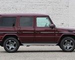 Front quarter view of a purple 2016 Mercedes-Benz G550 showcasing its distinctive boxy silhouette and five-spoke AMG wheels.