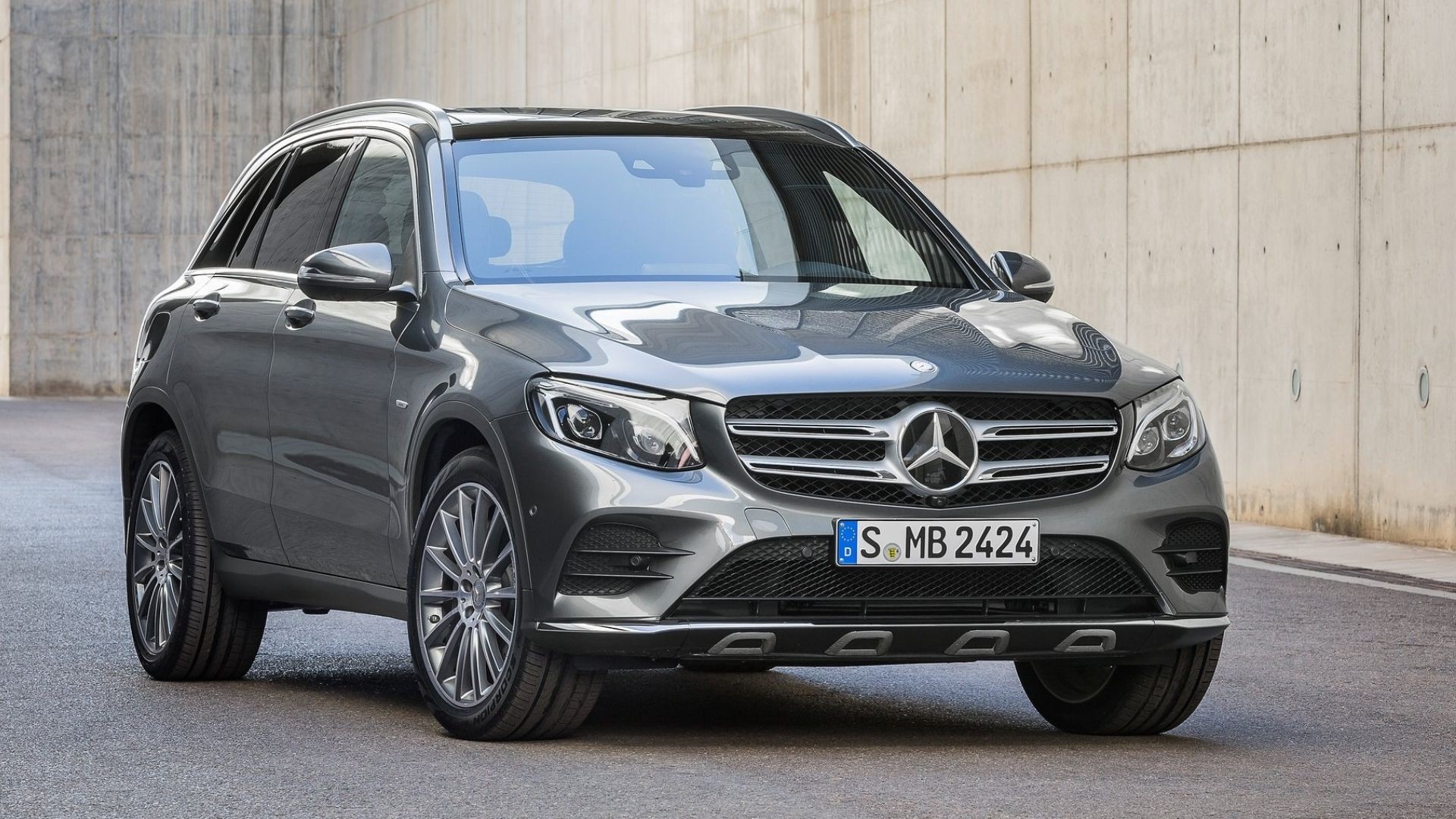 Grey 2016 Mercedes-Benz GLC 300 on display, emphasizing its first-generation status and modern crossover design.