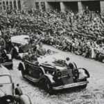 Hitler and Mussolini in Mercedes-Benz 770K during Munich parade, June 18, 1940