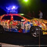 Mr. Brainwash live painting a Mercedes-Benz at the Evolution Tour concert