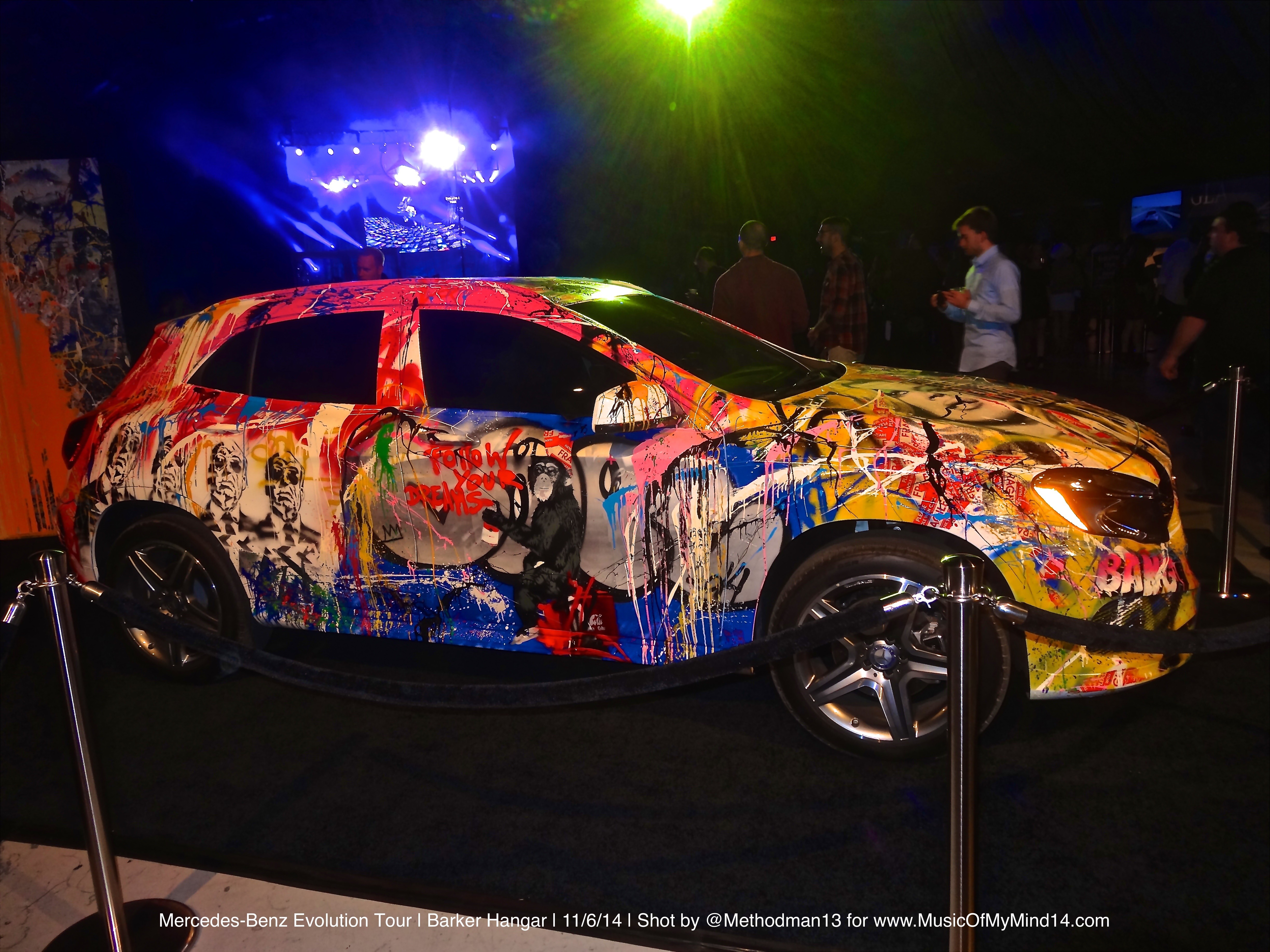 Mr. Brainwash live painting a Mercedes-Benz at the Evolution Tour concert