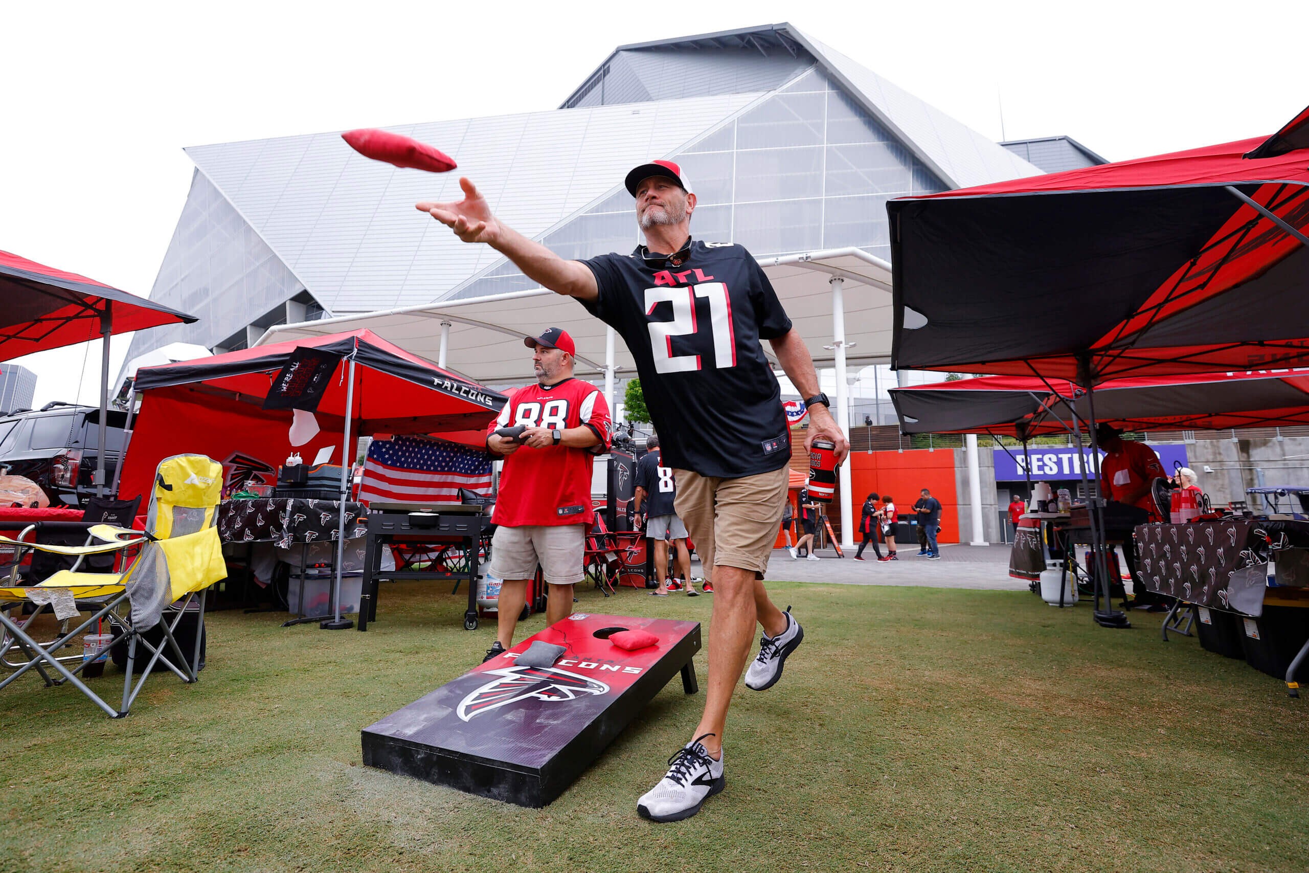 The Home Depot Backyard, an 11-acre greenspace outside Mercedes-Benz Stadium, is prime tailgating land for Falcons fans. (Todd Kirkland / Getty Images)