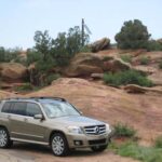 Mercedes Benz GLK 350 side profile on paved road