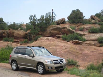 Mercedes Benz GLK 350 side profile on paved road