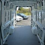 Front view of the 2012 Mercedes-Benz Sprinter 2500 cargo van highlighting its tall roof and boxy design