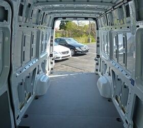 Front view of the 2012 Mercedes-Benz Sprinter 2500 cargo van highlighting its tall roof and boxy design