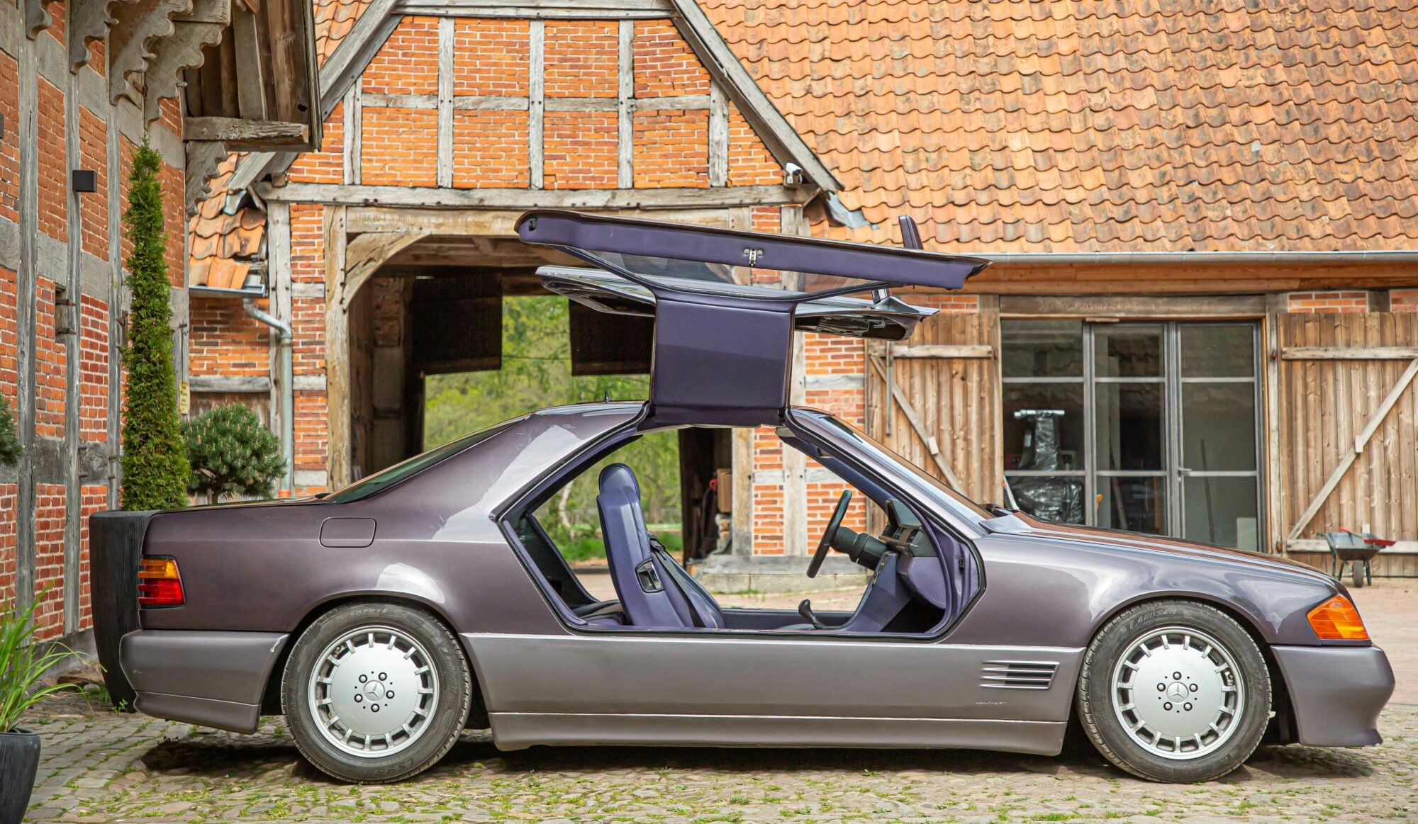 Front three quarter view of the silver Boschert B300 Gullwing Mercedes-Benz C124