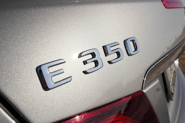 Detailed view of the 2014 Mercedes-Benz E350 Cabriolet interior showcasing leather seats and trim