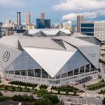 Aerial view of Mercedes-Benz Stadium showcasing its architecture and surrounding urban landscape